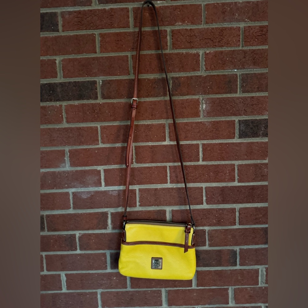 Dooney & Bourke Pebble Grain Dandelion and Brown Leather Crossbody Bag - Picture 2 of 13